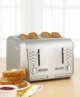 DeLonghi 4-slice Stainless Steel Toaster. Brand New, was opened only to check that everything works perfect. All metal design with stainless steel housing and die cast controls. Four extra-wide, extra-long toast loading slots; bread opening: 1.5 x 5.5. Cancel, defrost, reheat and bagel functions. Adjustable thermostat control with 6 settings. You can also safely and easily remove food with the extra-lift lever, and cleanup is quick and easy with the extra-deep crumb tray with convenient push-opening system. This toaster not only works great, but also looks great on your counter with a stainless steel exterior. Dimensions: 12.5W X 12.4 D x 8.8H. Weight: 7.3 lbs. 829-701-83-76
