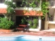 Quiet area just 2 minutes walking from the center and 5 minutes from the beach. Appartments on the 3thd floor with ocean view. 80m2, large terrace with direct views of the pool, 1 master bedroom with air conditionnig, 1 small bedroom with roof fan, kitchen, living room. Access to Internet WIFI, Tv Cable, private parking, back up generator, big pool, tropical garden. Very low maintenance fees. Perfect to live or for vacation rental.. Contact me for more information.
