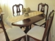 mahongany oval table with four chairs. excellent condition.809 610-7644.