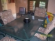 i have for sale a large rectangular garden table and 4 chairs.  the table is glass with central hole for parasol and green galvanised metal,  the chairs are also galvanised green metal with floral cushions  it is possible to sit more at the table bought $400US VGC canada NEED TO SELL HENCE DROP IN PRICE call 829-260-1676 