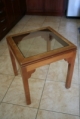 The wooden table with a glass cover, in good condition. Great for computer! kytephoto@gmail.com 8298066612